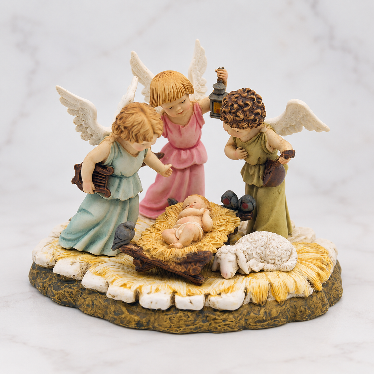 Estatuilla Niño Jesús con ángeles