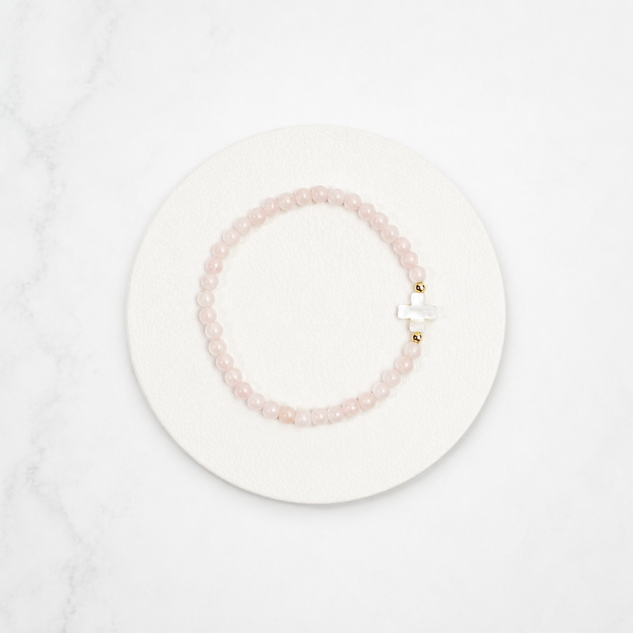 Pulsera Cruz cuarzo rosa
