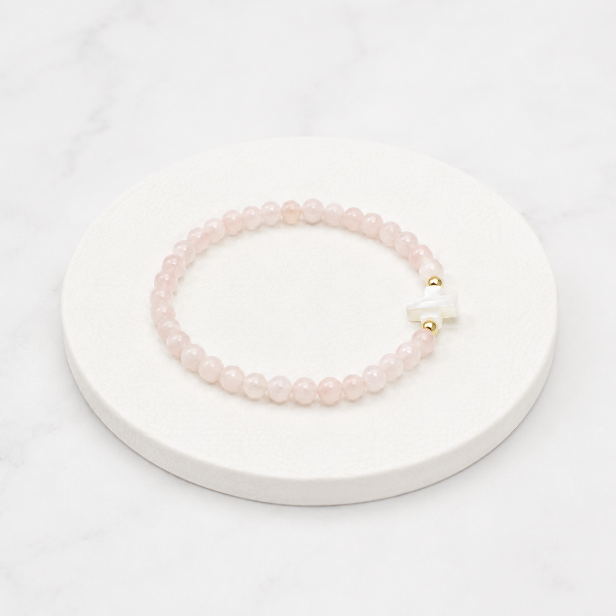 Pulsera Cruz cuarzo rosa
