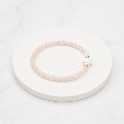 Pulsera Cruz cuarzo rosa